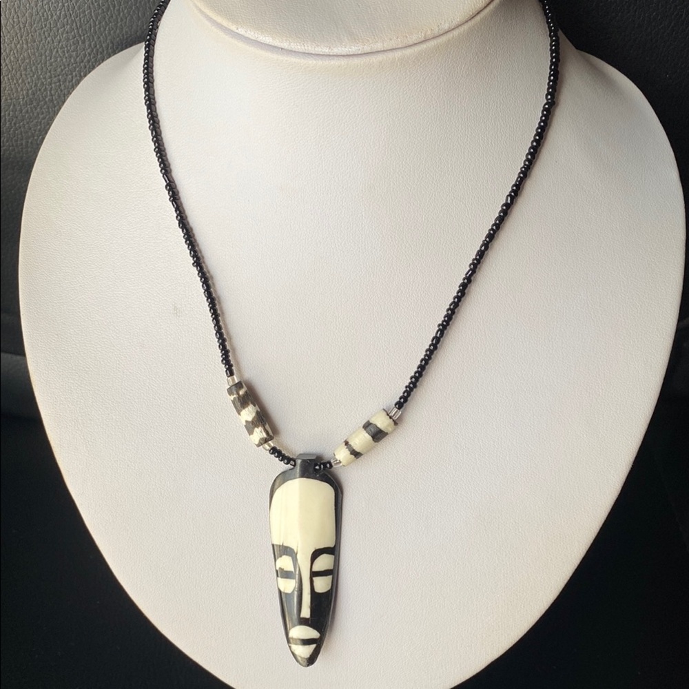 Black and Cream Beaded Necklace with Mask Pendant